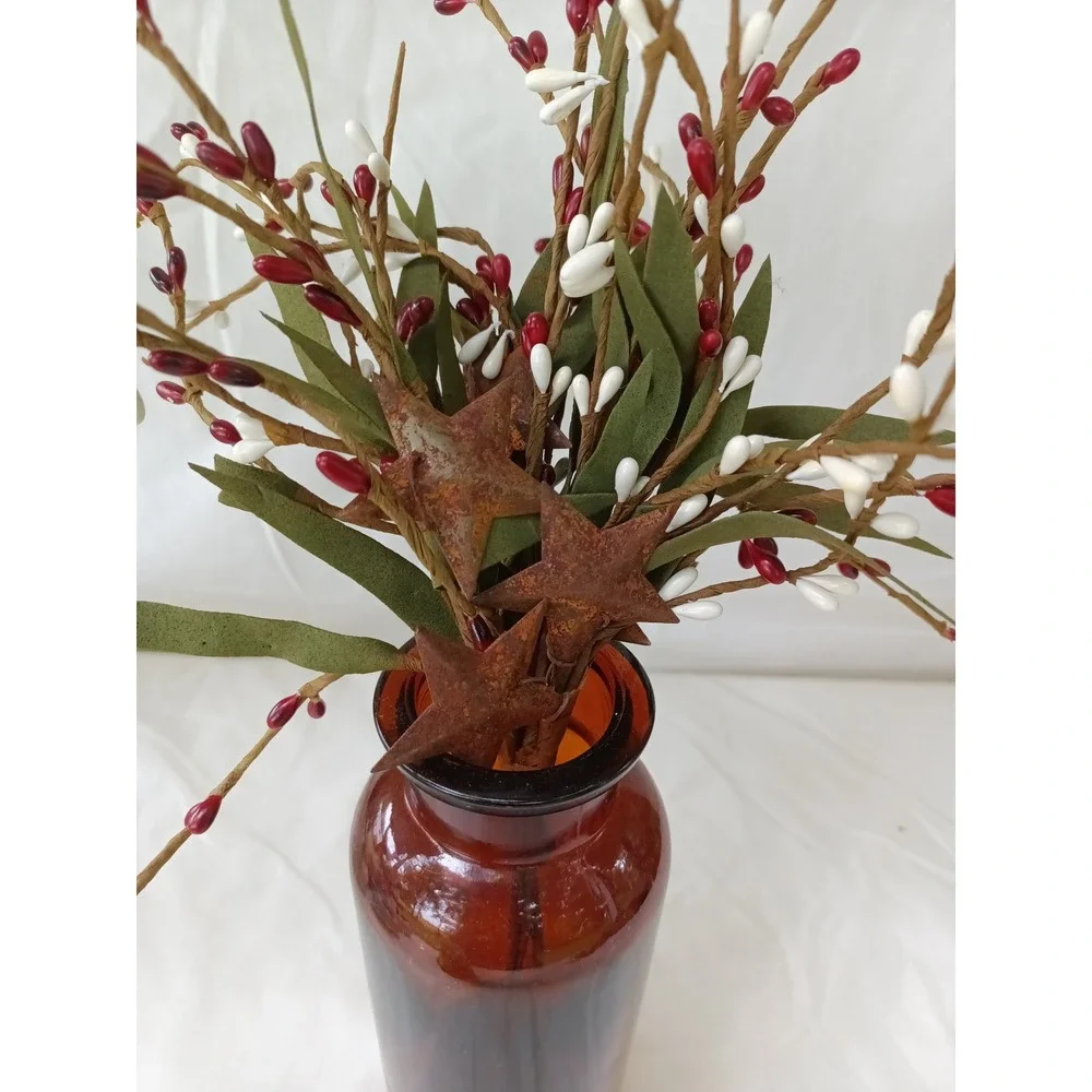 Amber apothecary bottle with red white pip berry pic w rusty stars